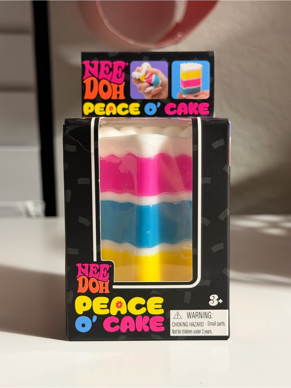 Rare NeeDoh Peace O' Cake Layered Squishy Stress Toy - Pink, Blue, Yellow, White